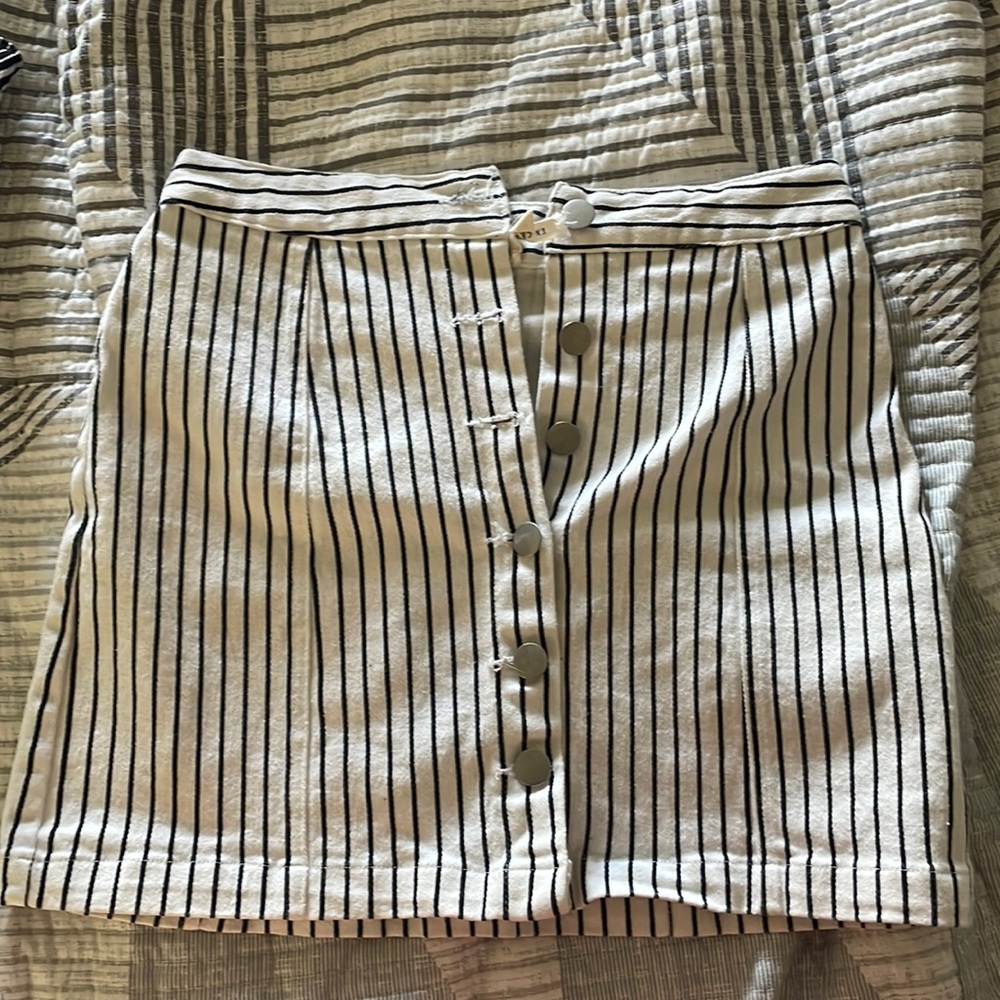 Small white denim skirt with black pinstripes